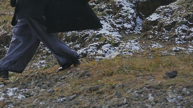 The Girl In The Bulk Pants Walking On Snow