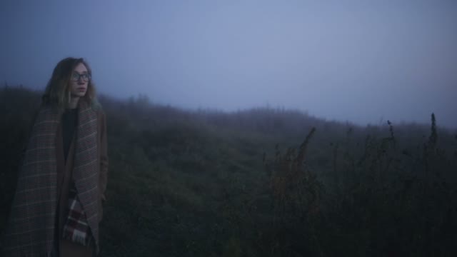 The Girl Wearing Glasses Walks In Misty Hills