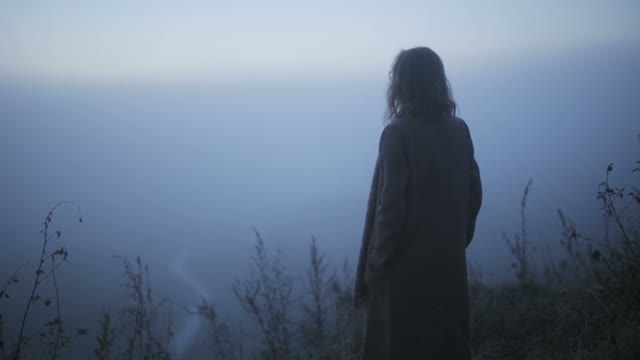 Girl With Glasses Looked Back In Thick Fog