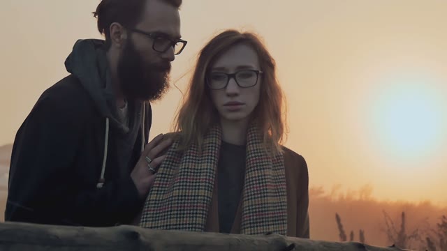 The Boy Whispered Something In The Ear Of His Girlfriend
