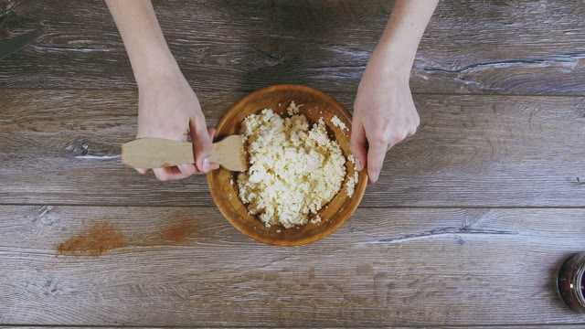 Women's Hands Stirred Curd
