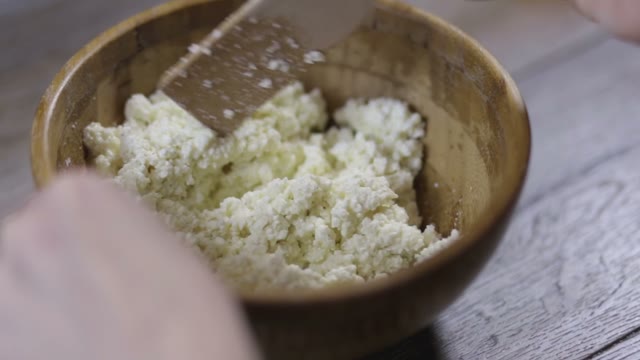 Hands Stirred Curd Close-up