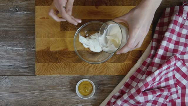Cook Preparing Sauce