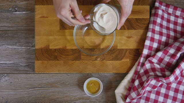 Cook Preparing Sauce