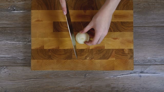 Onions Sliced Into Pieces With A Knife