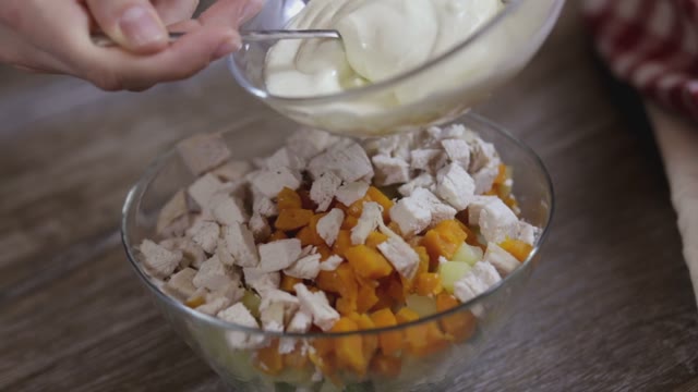 Cook Puts Sauce On Salad Close-up