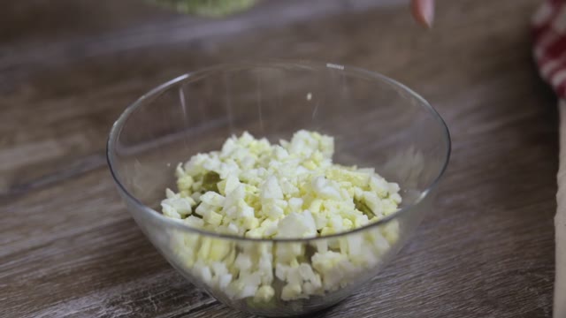 Cook Adding Green Peas To The Salad Close-up