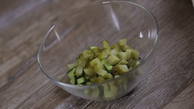 Cook Adds Eggs To The Salad Close-up