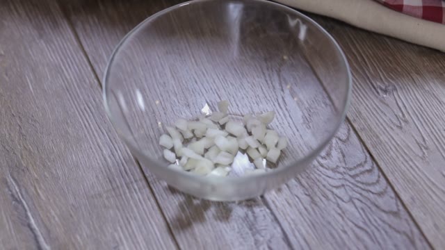 Cook Adds Cucumber To A Salad Close-up