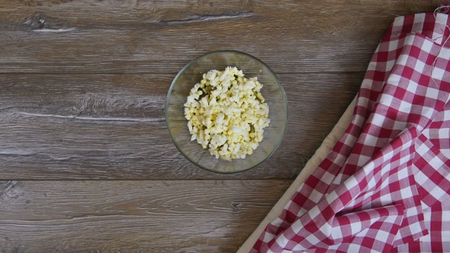 Cook Adding Green Peas To The Salad