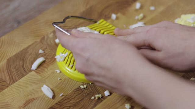 Cutting Eggs Of Egg Slicer Close-up