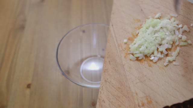 Pieces Of Onions Lay Out On The Glass Bowl Close-up