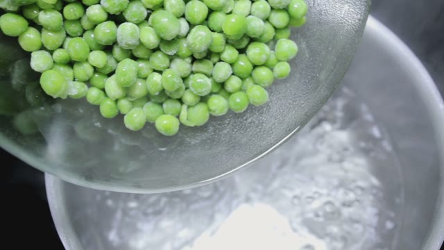 Green Peas In Bowl Shift In Water Close-up