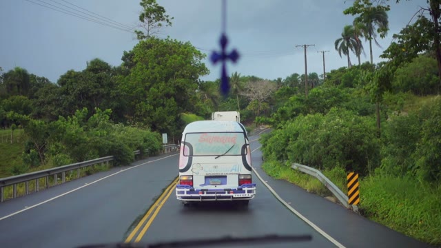The Road In The Tropics With The Bus In The Rain