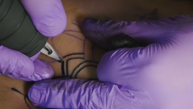 Tattoo Master Makes The Tattoo Close-up