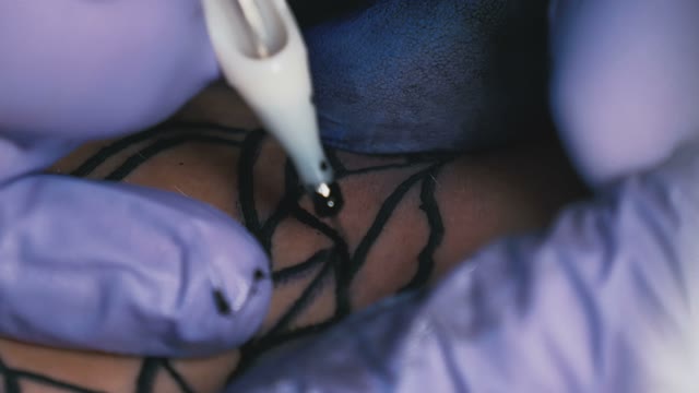 Tattoo Master Makes The Tattoo Close-up