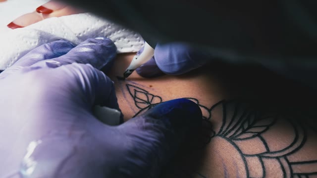 Tattoo Master Makes The Tattoo Close-up
