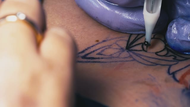 Tattoo Master Makes The Tattoo Close-up
