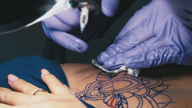 Tattoo Master Makes The Tattoo Close-up