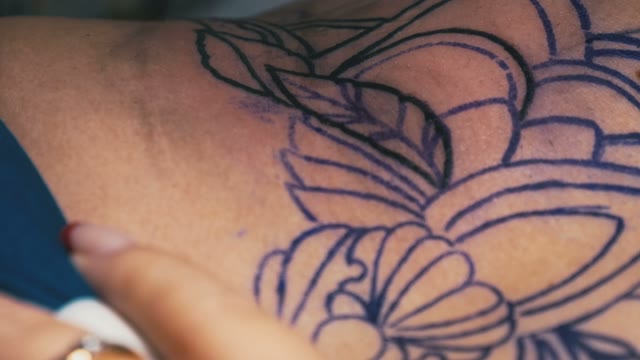 Tattoo Master Makes The Tattoo Close-up