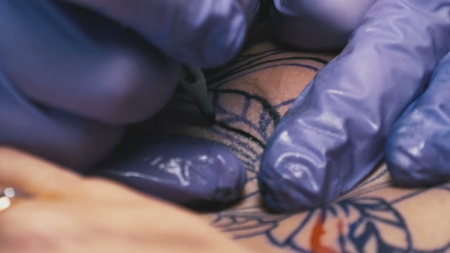 Tattoo Master Makes The Tattoo Close-up