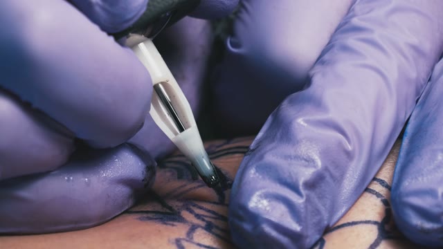 Tattoo Master Makes The Tattoo Close-up