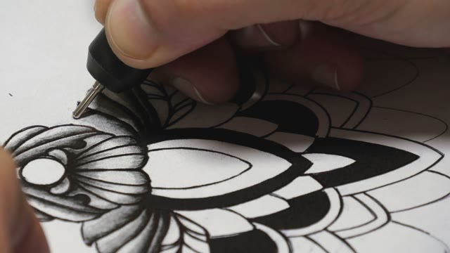 Tattoo Master Drawing Sketch Close-up