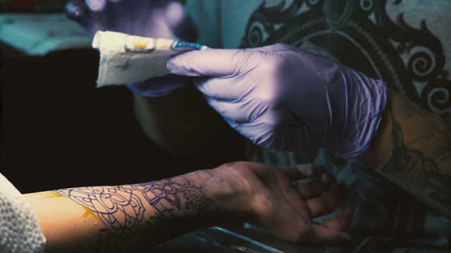 Tattoo Master Does Tattoo On Hand Close-up