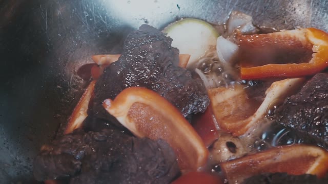 The Chef Prepares A Dish Of Meat And Vegetables