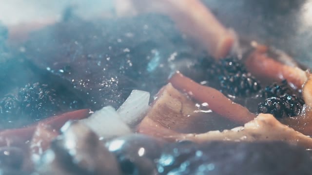 Red Pepper And Stewed Berries In A Skillet