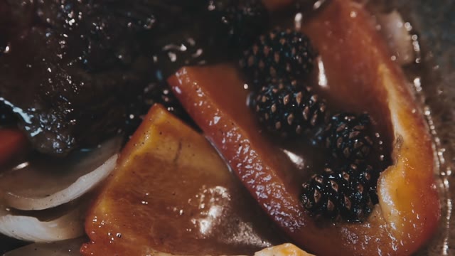 Bulgarian Pepper And Stewed Berries In A Frying Pan