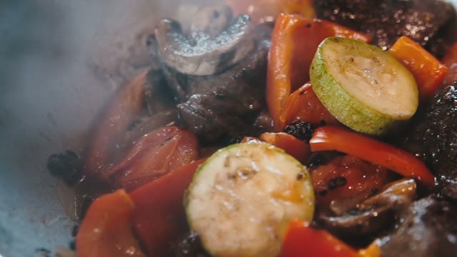 Steamed Vegetables With Meat In An Iron Frying Pan