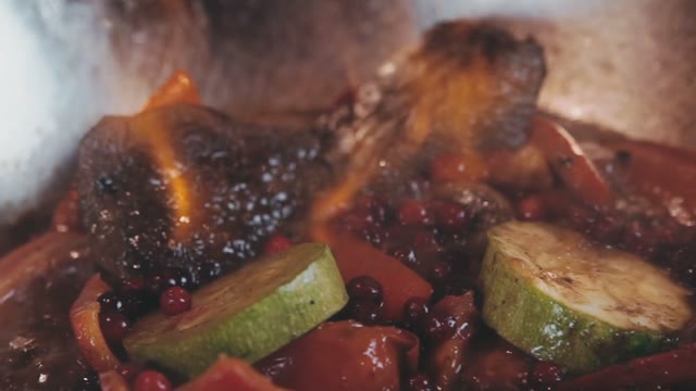 Vegetables And Meat Stew Over An Open Fire