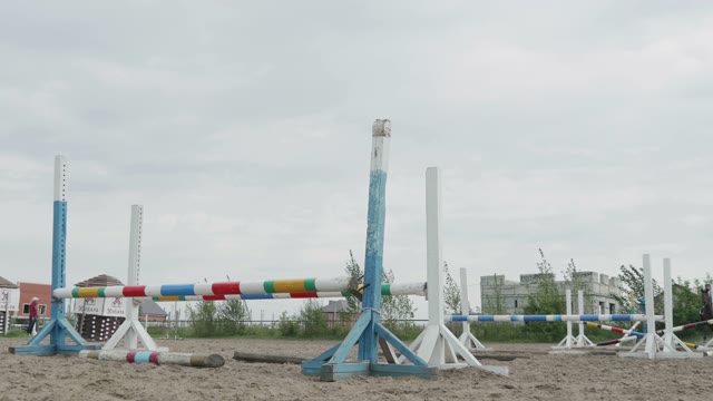 Horse Jumping Over Obstacles