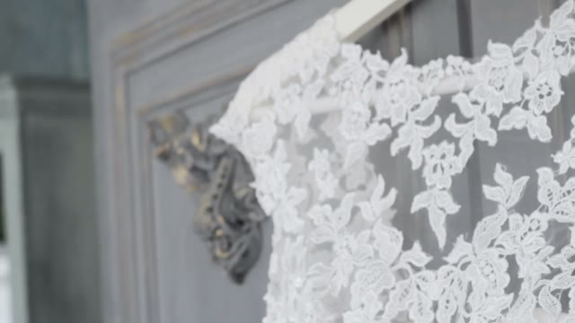 Wedding Dress Hangs On Hangers Close-up