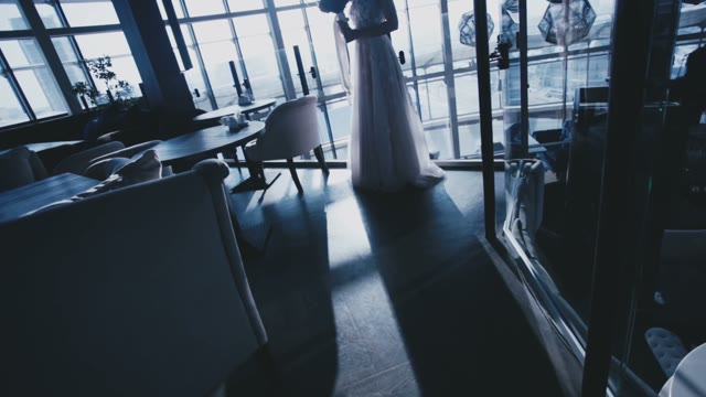 The Bride With A Bouquet Of Flowers In Blue Tones