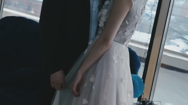 A Very Beautiful Newlywed Couple Embracing