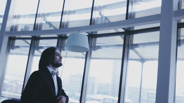 Beautifully Dressed Groom Stood At The Window