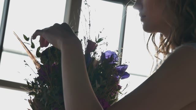 Beautiful Bridal Bouquet In The Hands Of A Young Girl