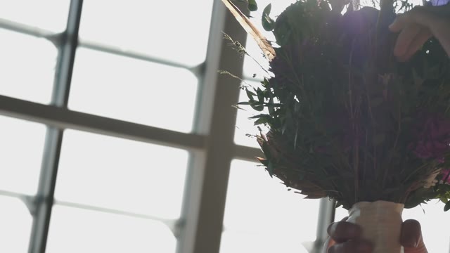 The Young Girl Touching Flowers From Her Wonderful Bride's Bouquet