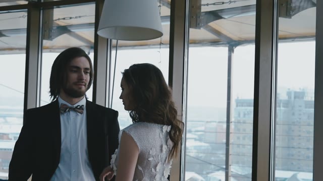 Bride In Beautiful Dress Clung To The Arm Of Her Future Husband