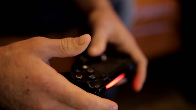 The Guy Playing The Video Game Joystick