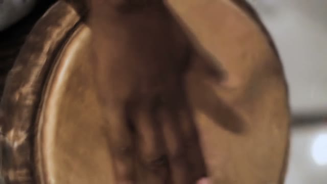 Man Hits Drum Close