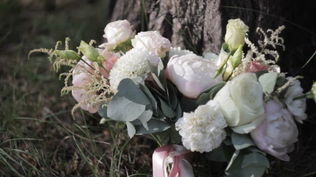 Bouquet Of Flowers On The Grass Close-up