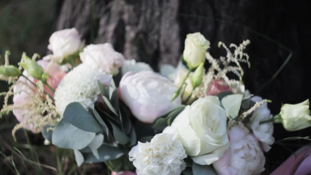Bouquet Of Flowers On The Grass Close-up