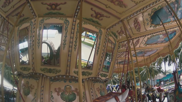 People Rides On The Carousel