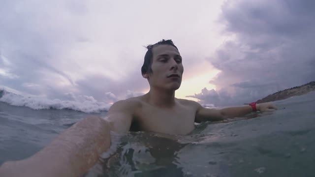 Man Is Covered By A Sea Wave Close-up