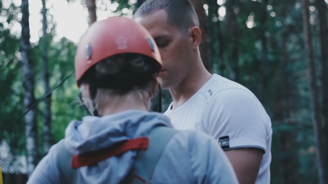 The Instructor Prepares The Tightrope Walker Girl To The Passage Of Obstacles