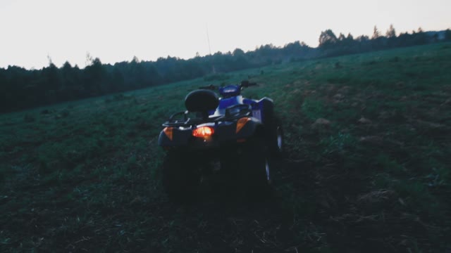 The Guy Sits On A Quad Bike And Went