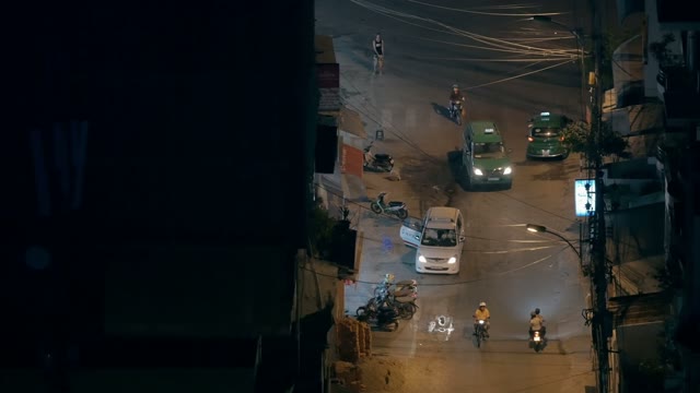 People Riding Mopeds